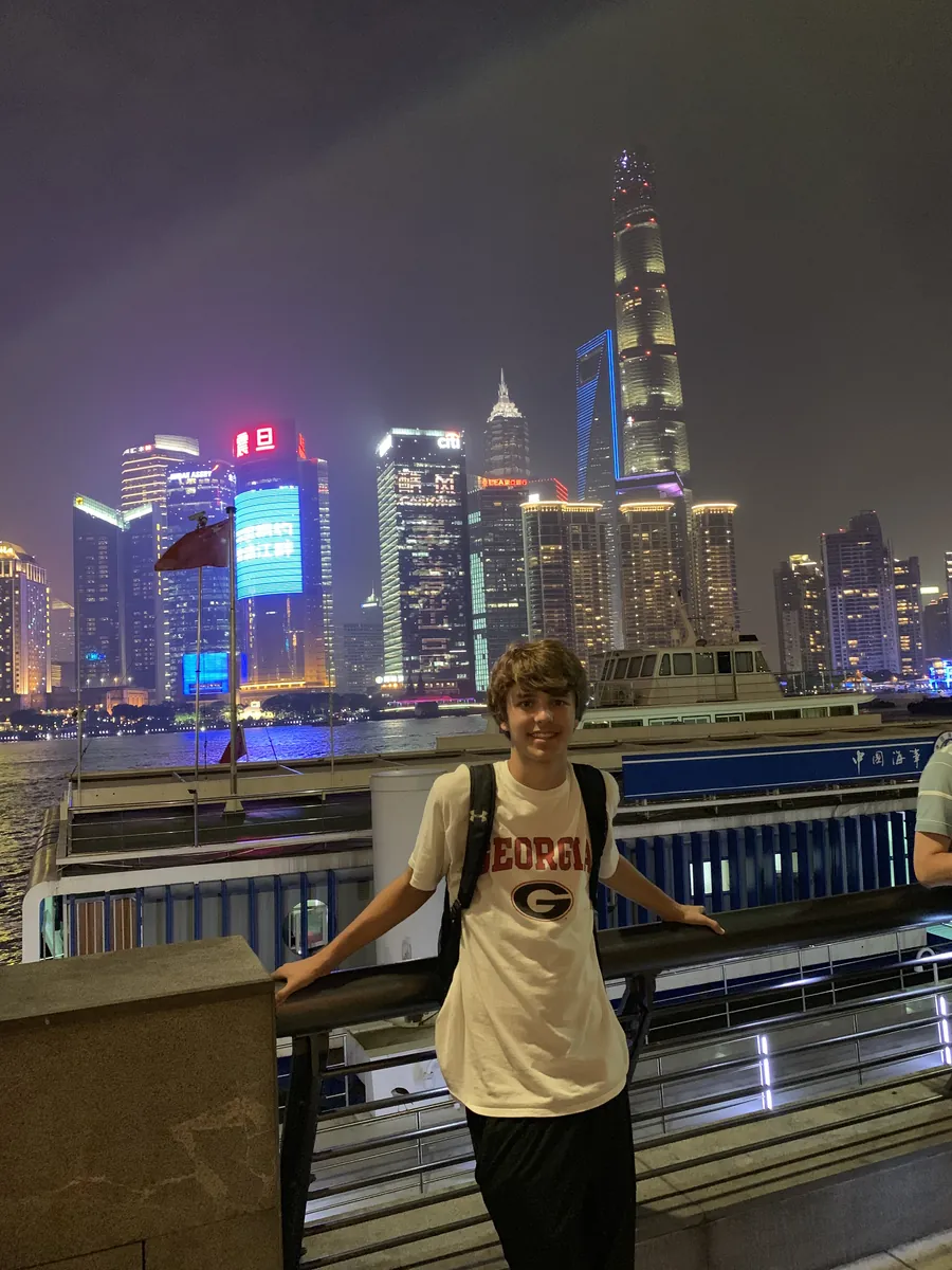 Brock Pivec with the Shanghai skyline