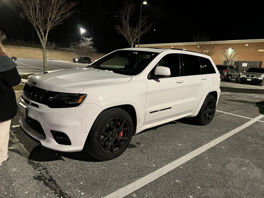 Brock Pivec's white Jeep Grand Cherokee SRT, black wheels and red calipers